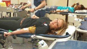 Northwestern College Medical Assisting students Deanna Vazquez (front) and Brittany Parker (back) of Chicago donated blood at the College's Spring Blood Drive in Chicago.