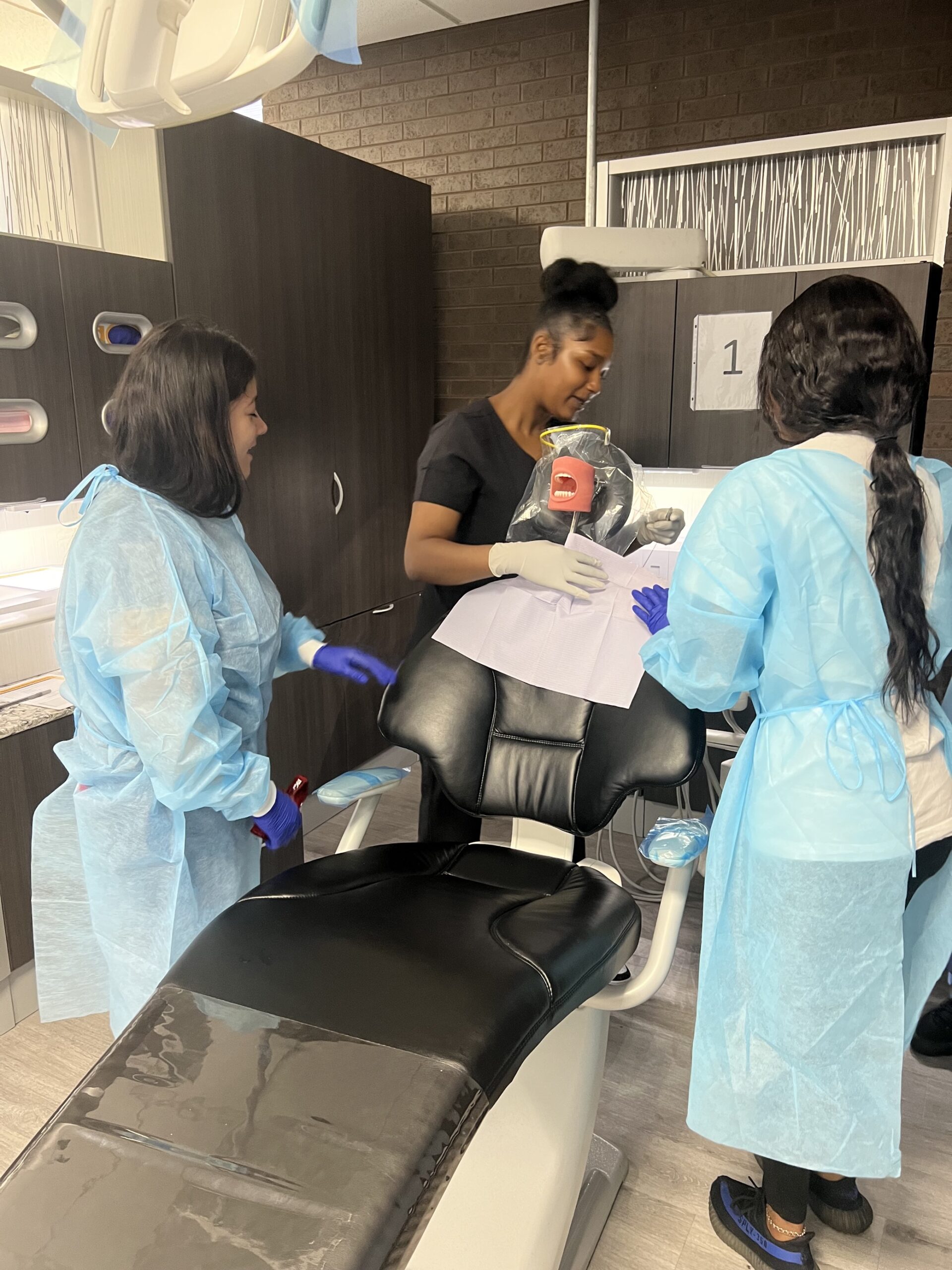 Dental assisting students in lab